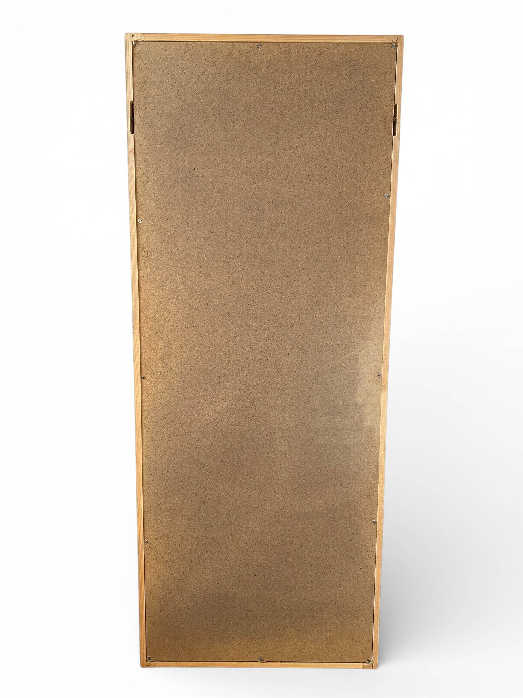 Modernist mirror in solid elm from the 1950s.