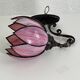 pair of iron wall lamps and Tiffany style glass legs