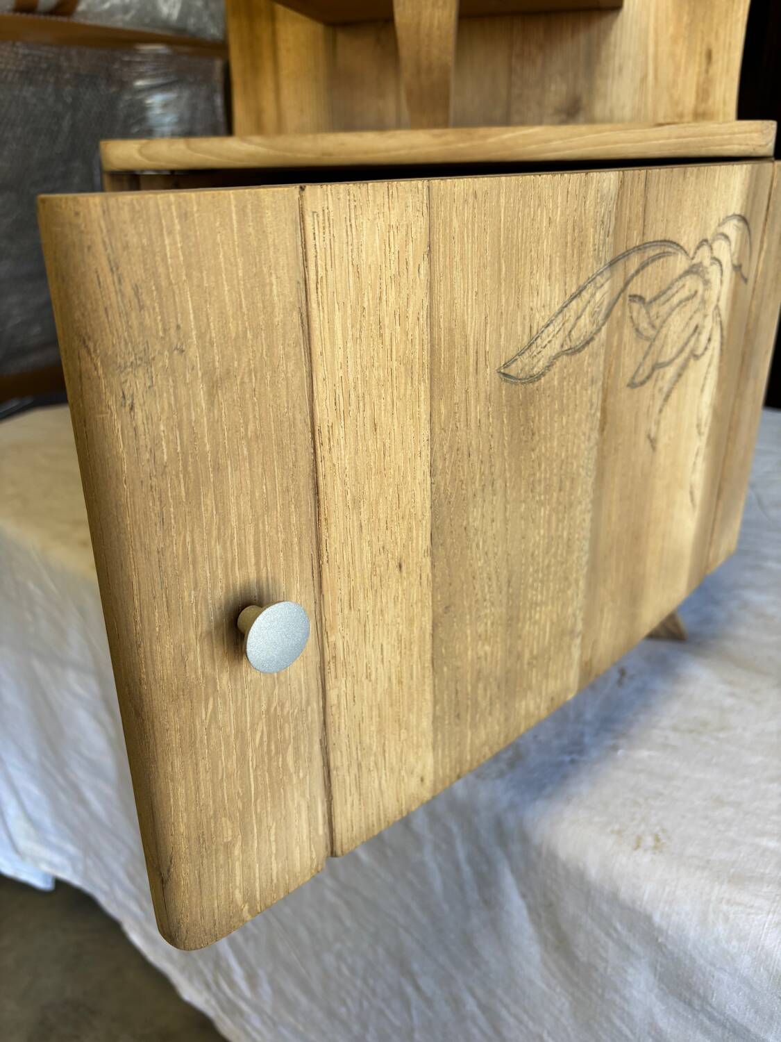 Raw wood bedside table