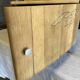 Raw wood bedside table