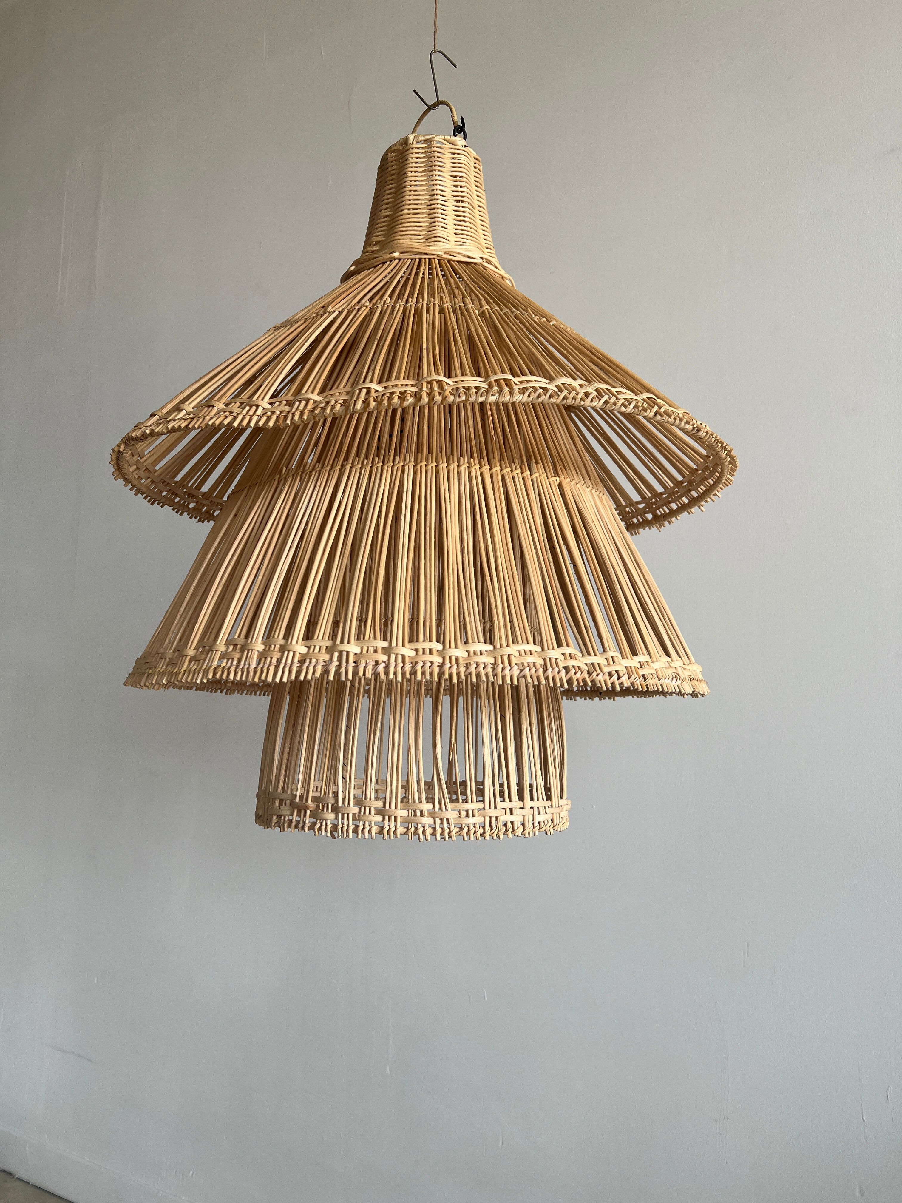 Rattan pendant lamp or light in the shape of an Asian lantern