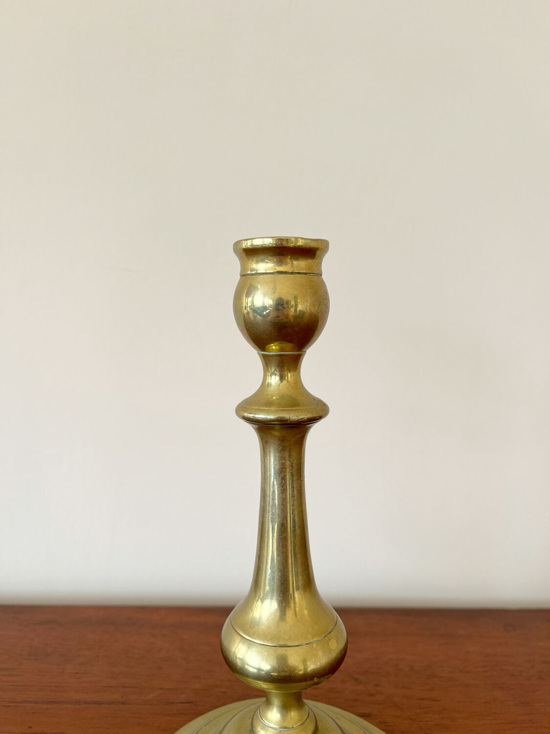 Vintage baluster-shaped antique brass candlestick