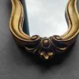 Baroque style gilded mirror.