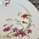 8 assiettes en porcelaine fleurie, fin XIXeme
