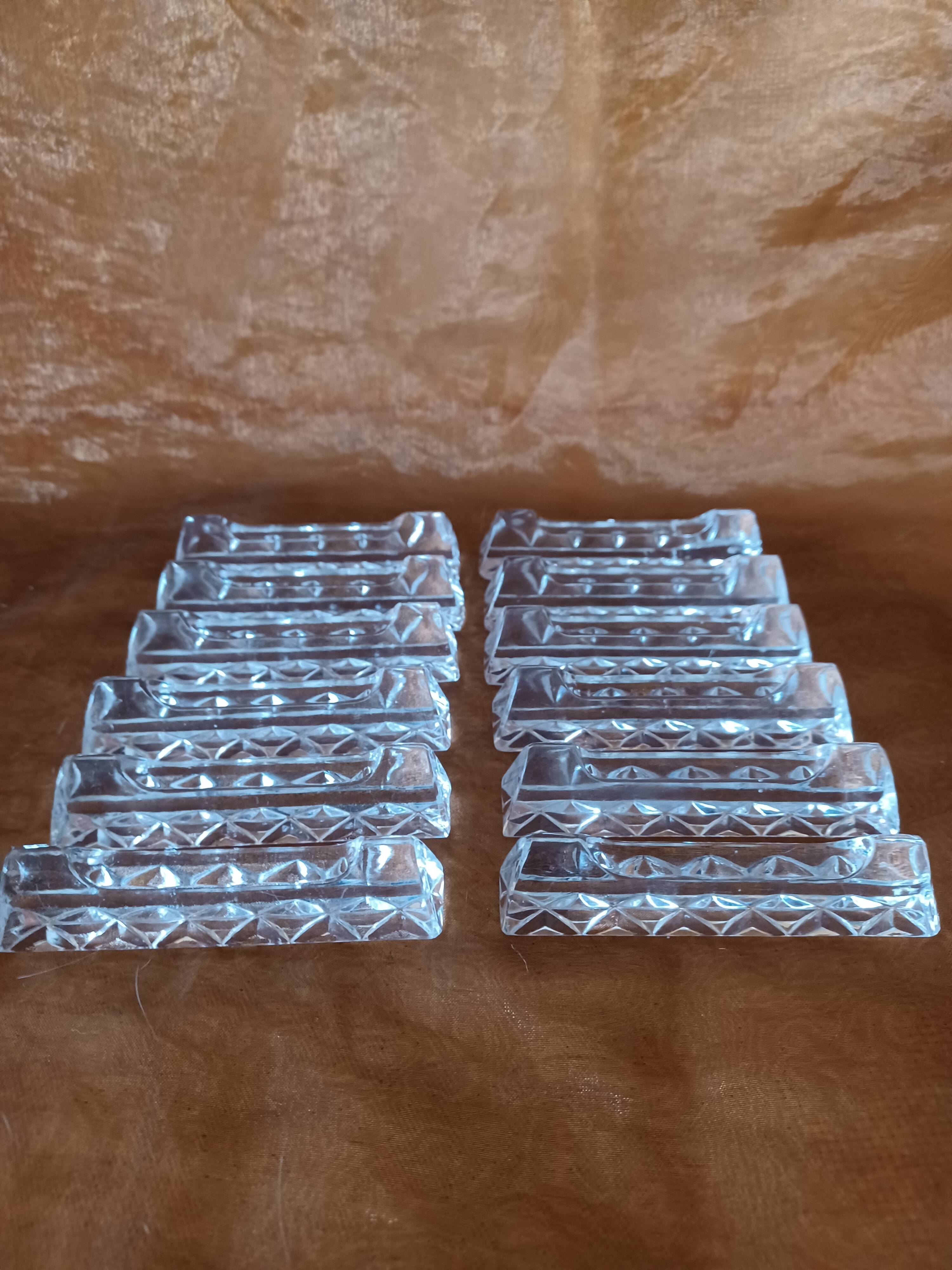 12 cut crystal knife holders.