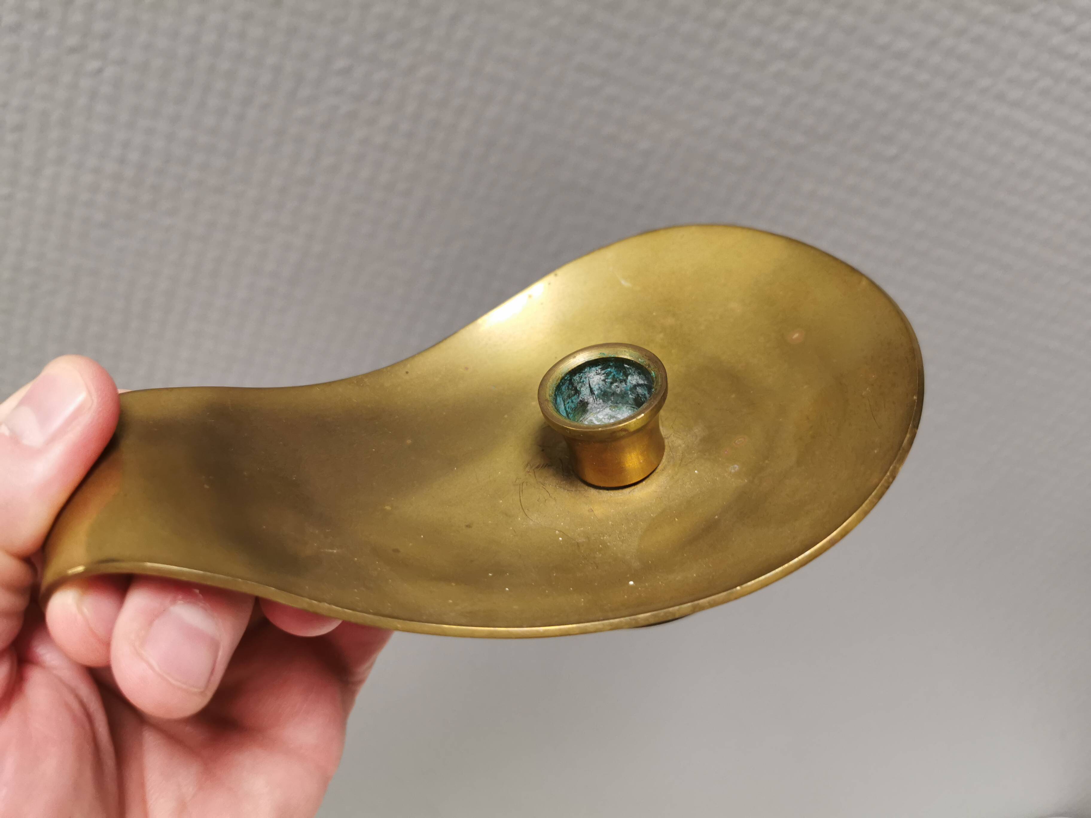 Brass candlestick for a single candle