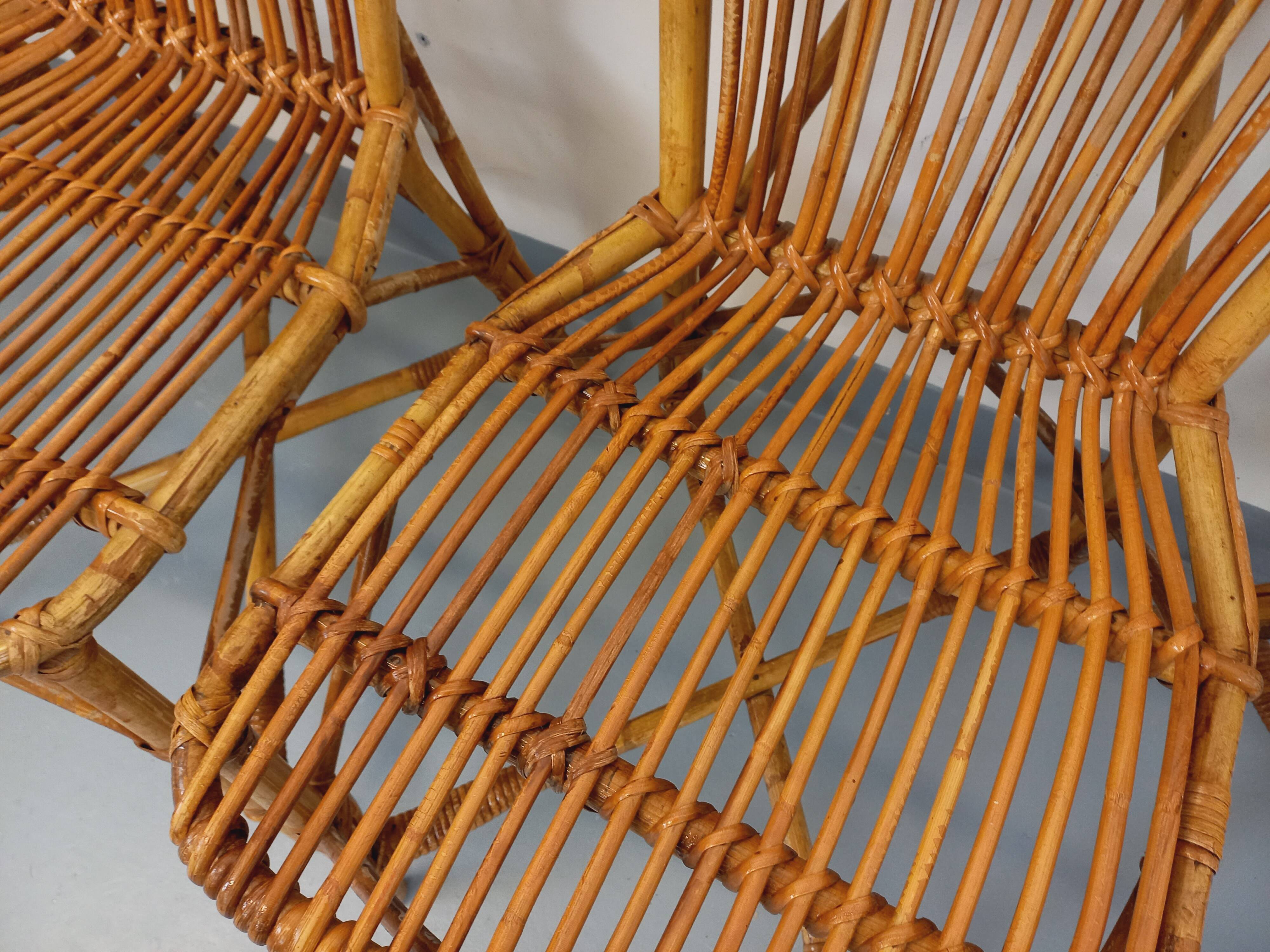Set of 4 vintage Audoux Minet rattan chairs from the 1950s and 60s.