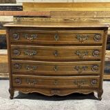 Curved commode in Louis XV style made of walnut.