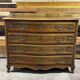 Curved commode in Louis XV style made of walnut.