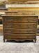 Curved commode in Louis XV style made of walnut.