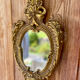 oval decorative wall mirror in Louis XV style