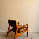 Scandinavian armchair in leather and walnut by Ferdinand 1960