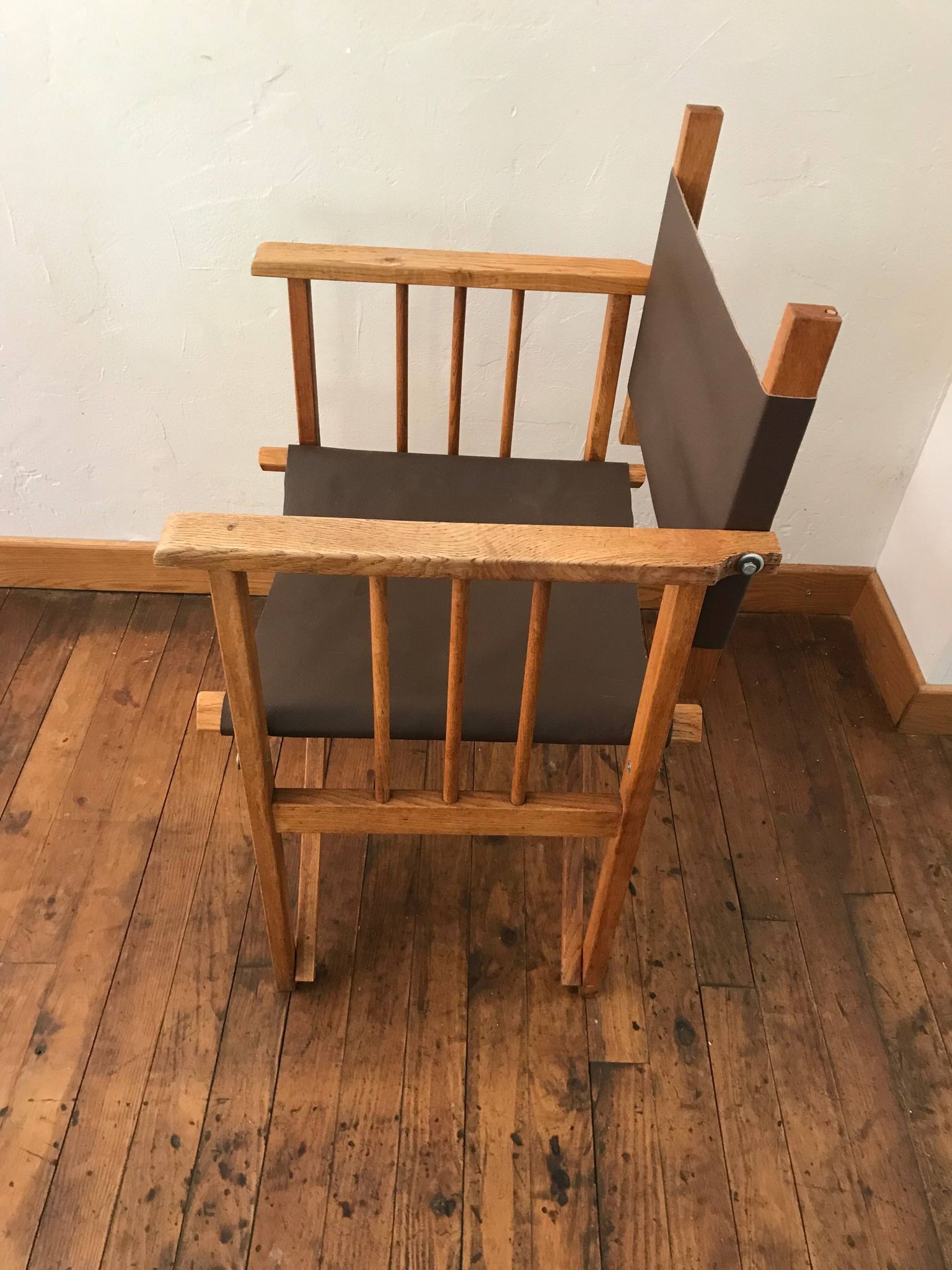 pair of Safari armchairs in wood and leather