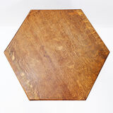 Hexagonal pedestal table or side table with a lattice structure and star pattern.
