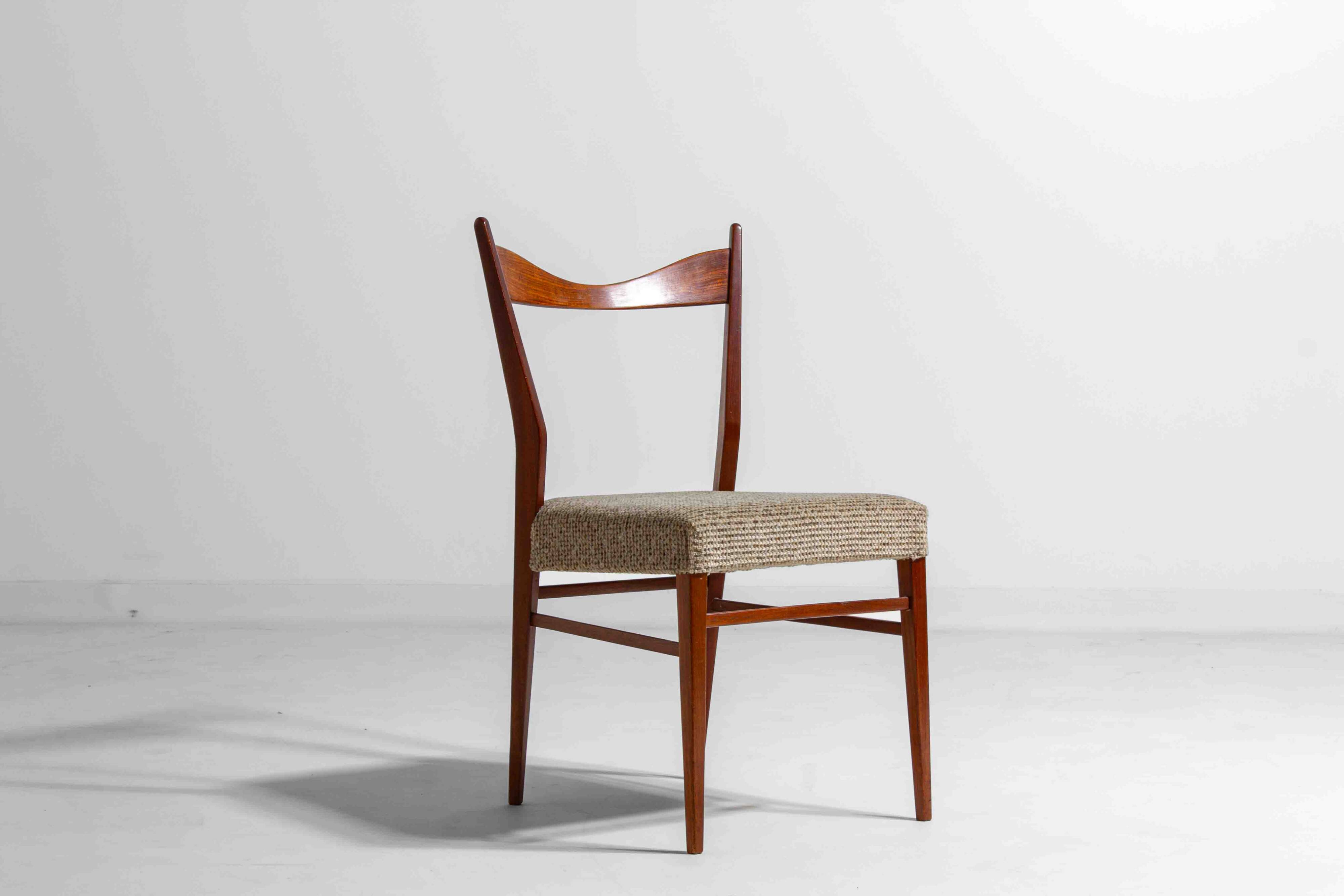 Set of slender mid-century dining chairs with finely curved backs, 1960s