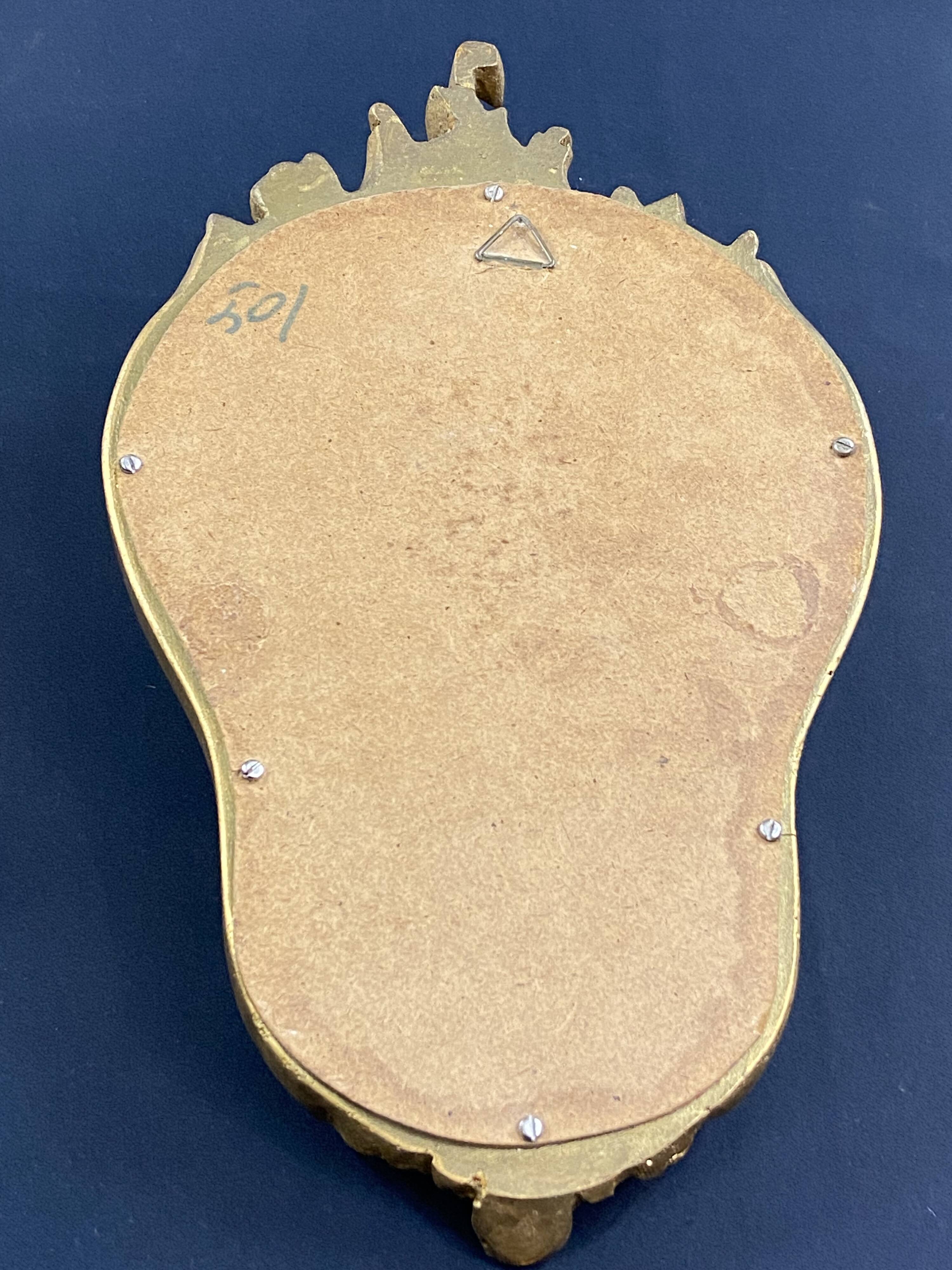 Violin mirror with shell decoration
