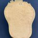 Violin mirror with shell decoration