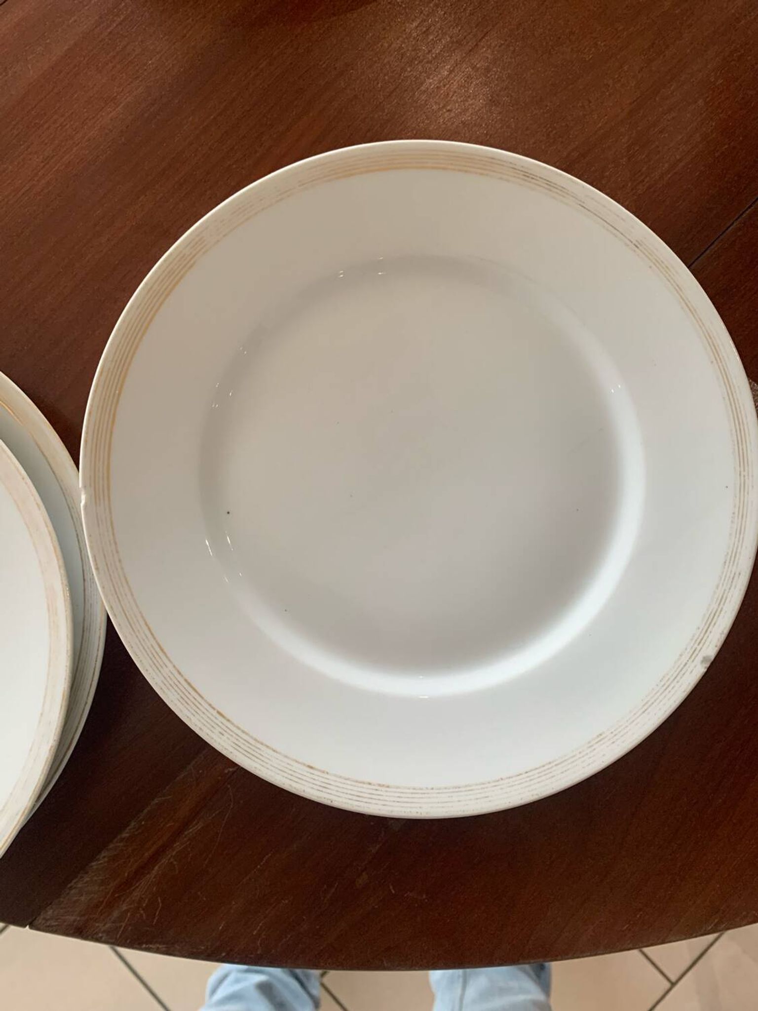 Lot of six flat plates, crockery, old white, gilded