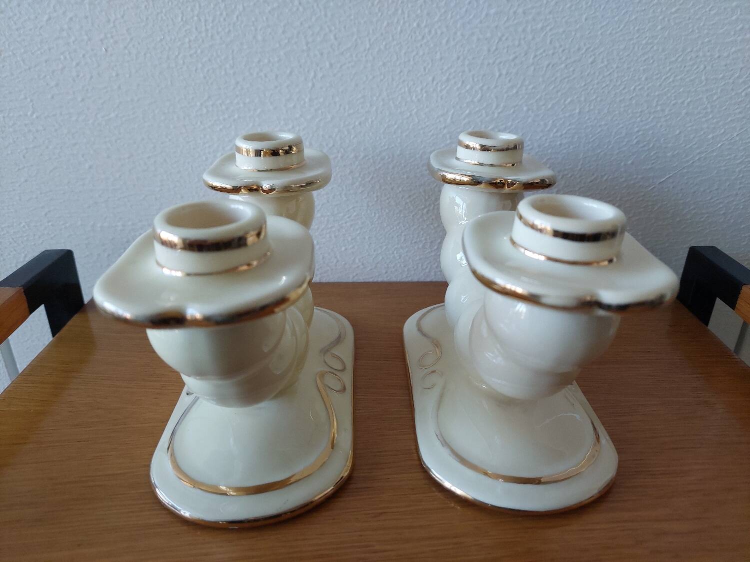 Pair of cream ceramic candlesticks with gold trim circa 1930-1950