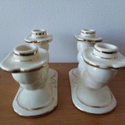 Pair of cream ceramic candlesticks with gold trim circa 1930-1950