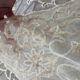 Old tablecloth embroidered with openwork embroidery.