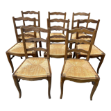 8 vintage rustic mulched chairs