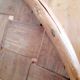 Old bamboo/rattan table with woven palm leaves.