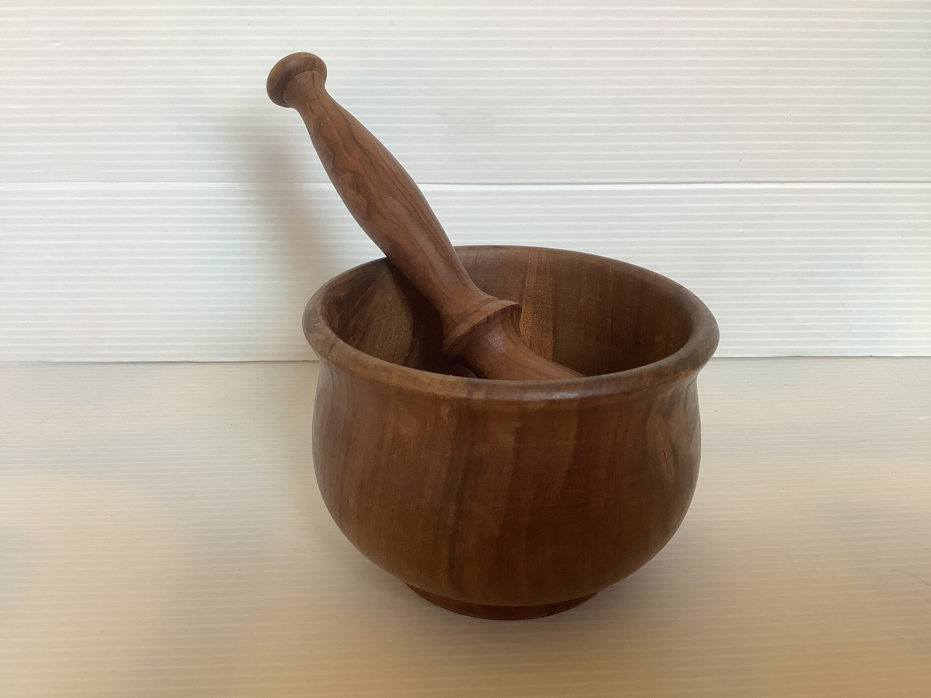 Mortar and wooden pestle
