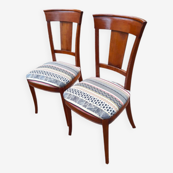 2 varnished solid wood chairs with "ethnic" padding