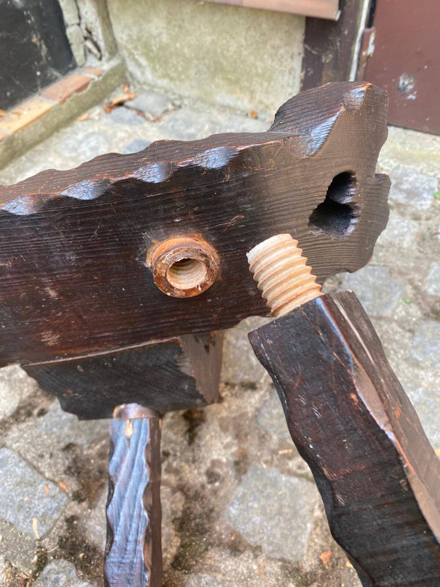 Vintage brutalist tripod chair in carved wood with wooden screw assembly XI.