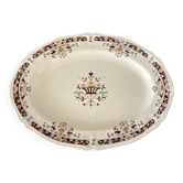 Plat de service ancien en faïence de Longchamp