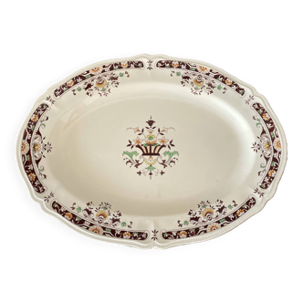 Antique serving dish in Longchamp earthenware.