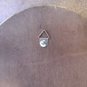 Ancien miroir ovale guilloché doré et peint