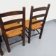 Set of 4 vintage brutalist chairs by Georges Robert in wood and straw.