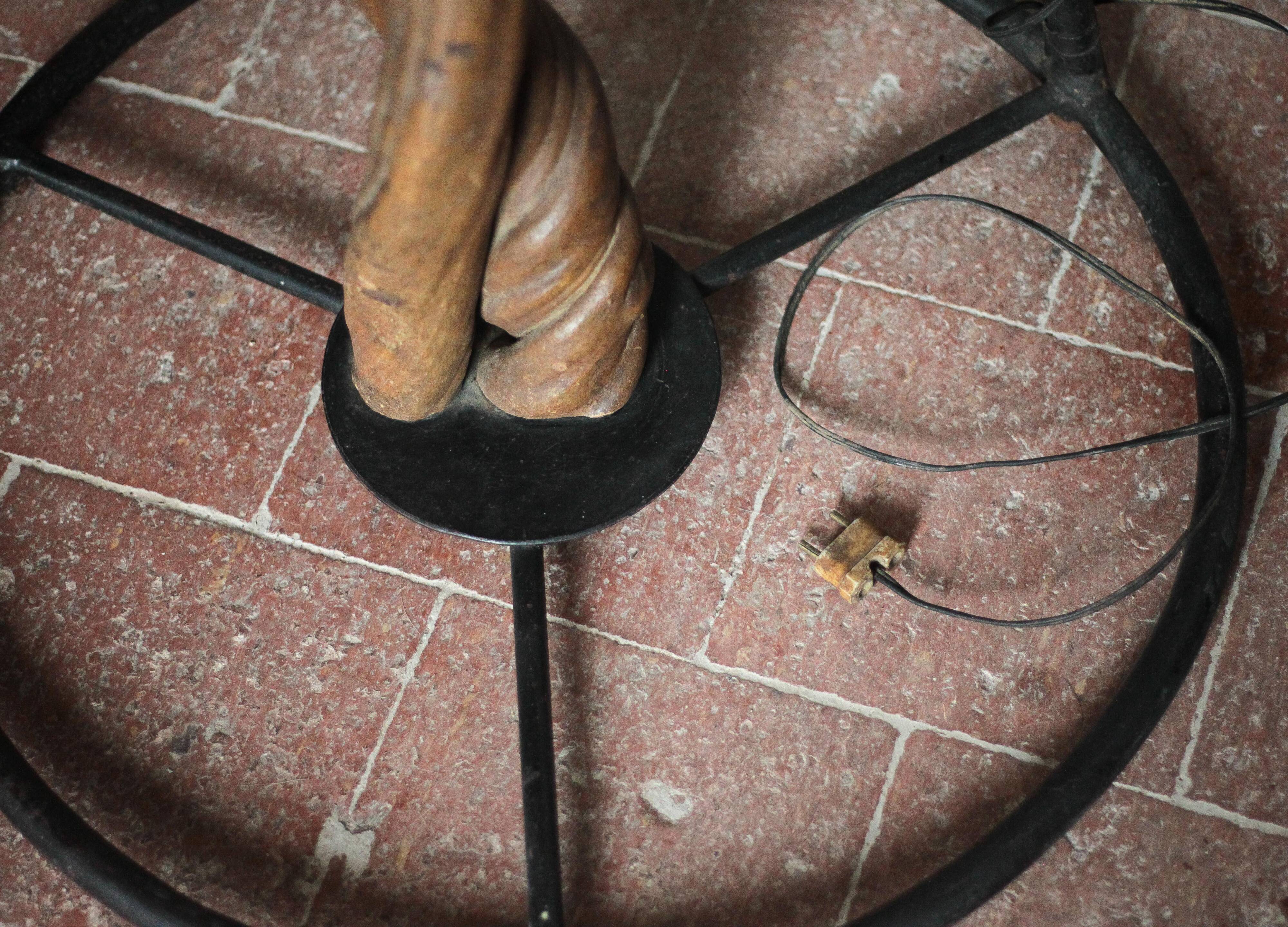 Liane and metal floor lamp with perforated leather shade featuring elephant patterns, lise.