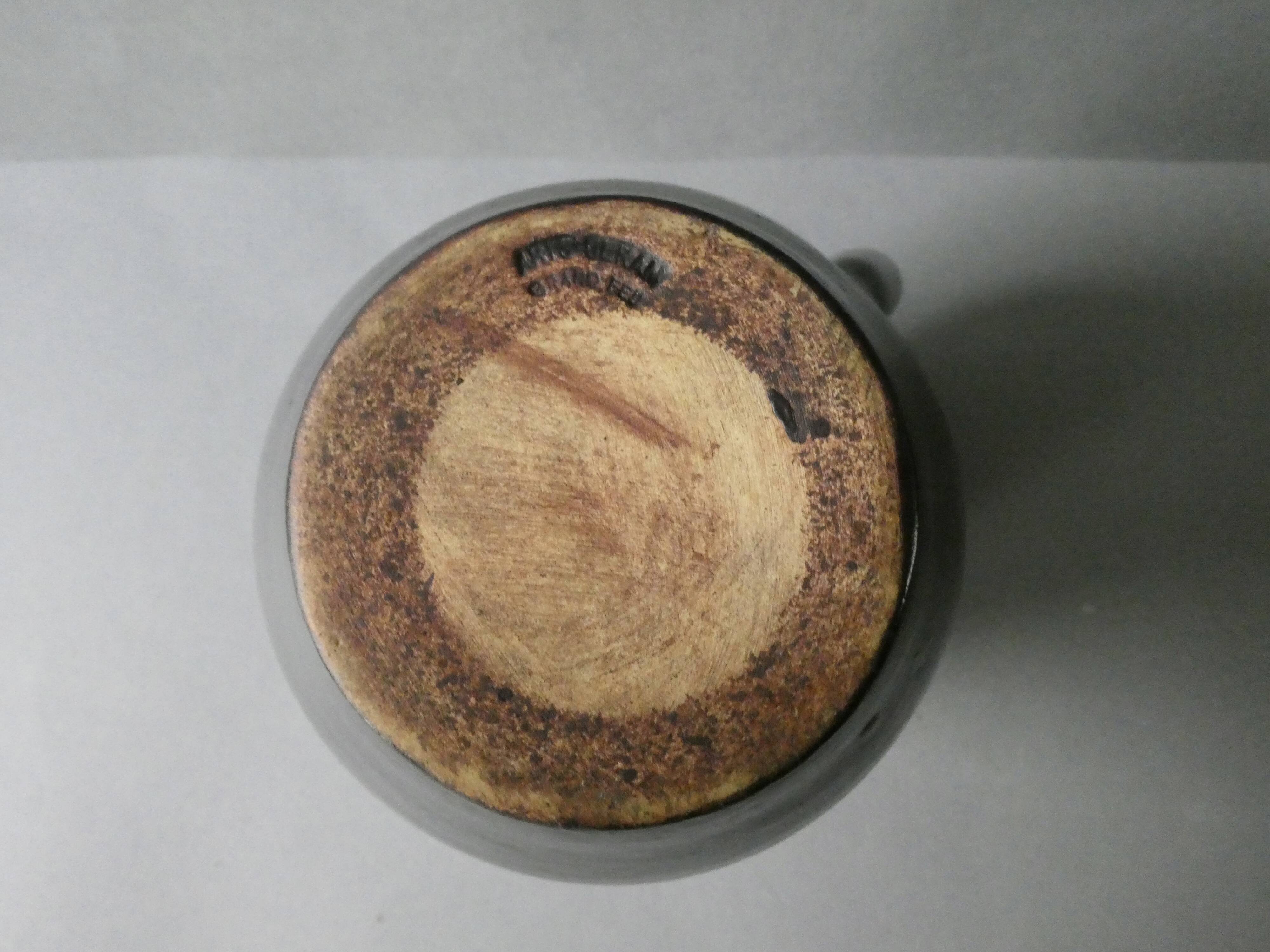 Glazed stoneware pitcher, signed Denise and Michel Pointu