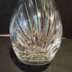 Vintage cut crystal carafe with floral stopper.