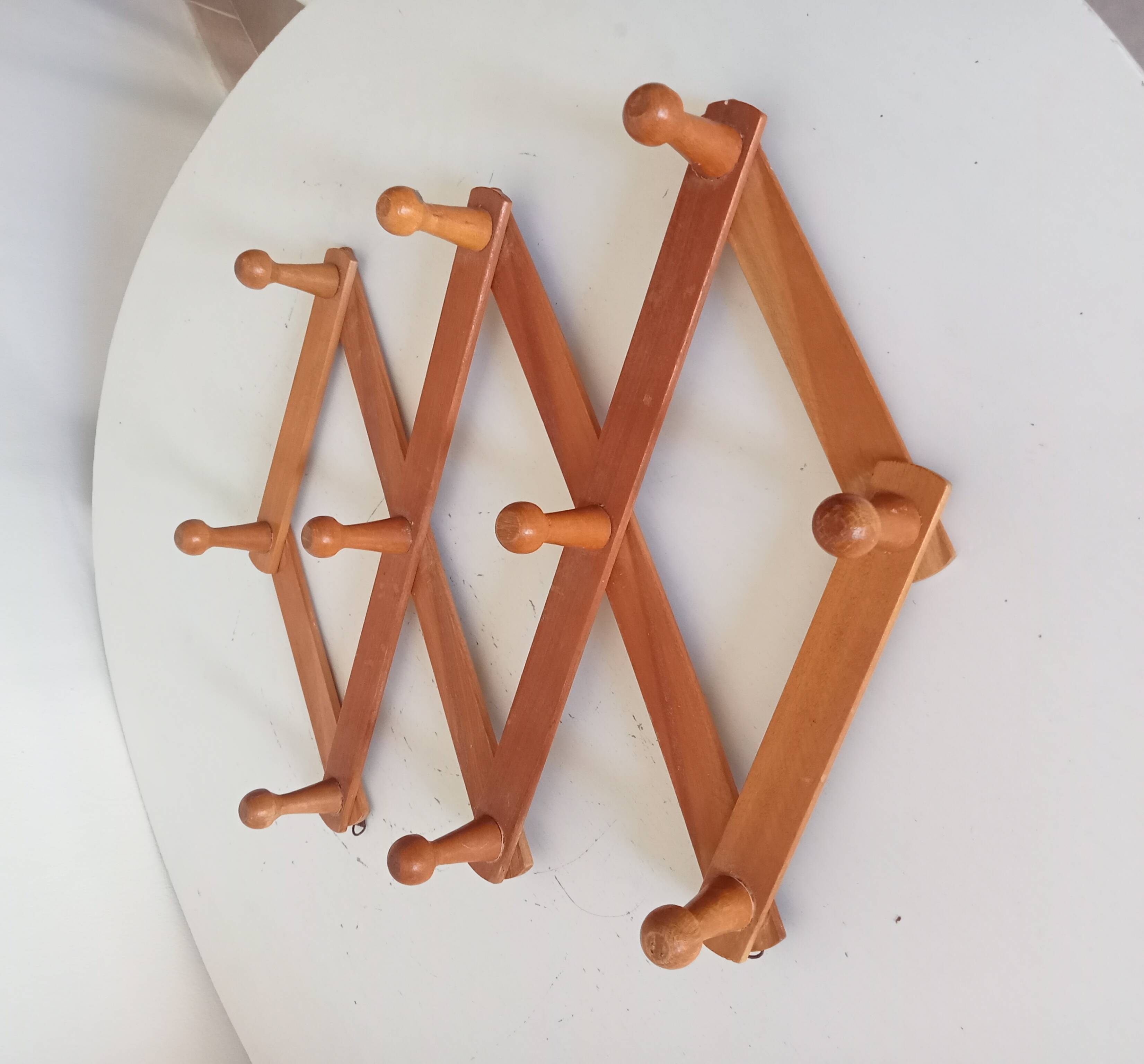 Vintage accordion wall coat rack