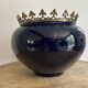 Ceramic cache-pot with bronze frame