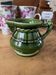 Green ceramic milk jug