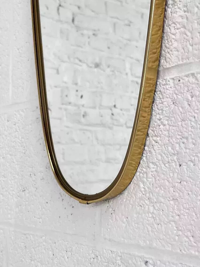 Miroir doré rétroviseur et forme libre des années 50