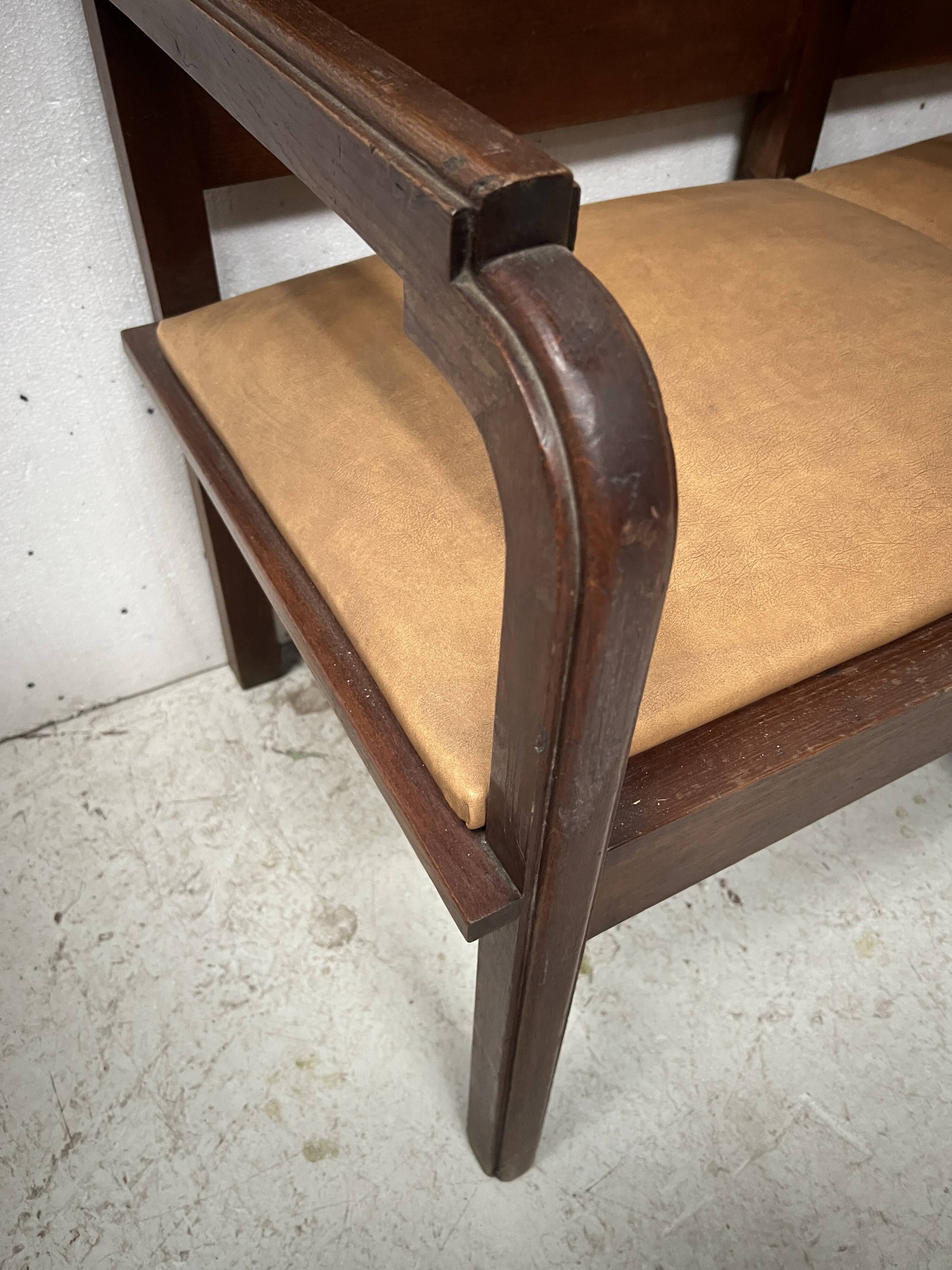 Art Deco two-seater bench in solid mahogany, 20th century.