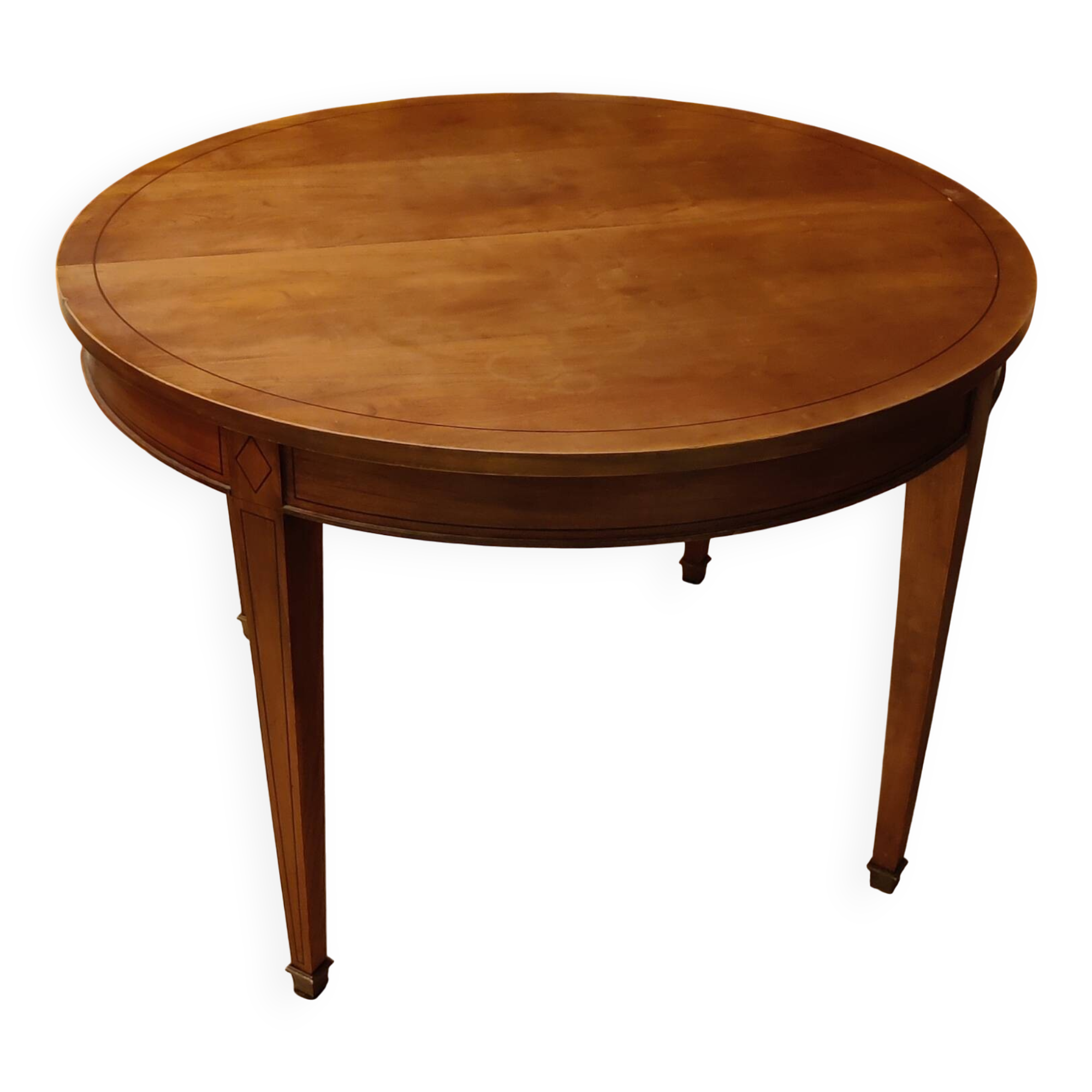 Round cherry table with extension, 3 chairs and 1 armchair.