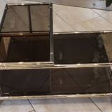 Table basse laiton verre fumé