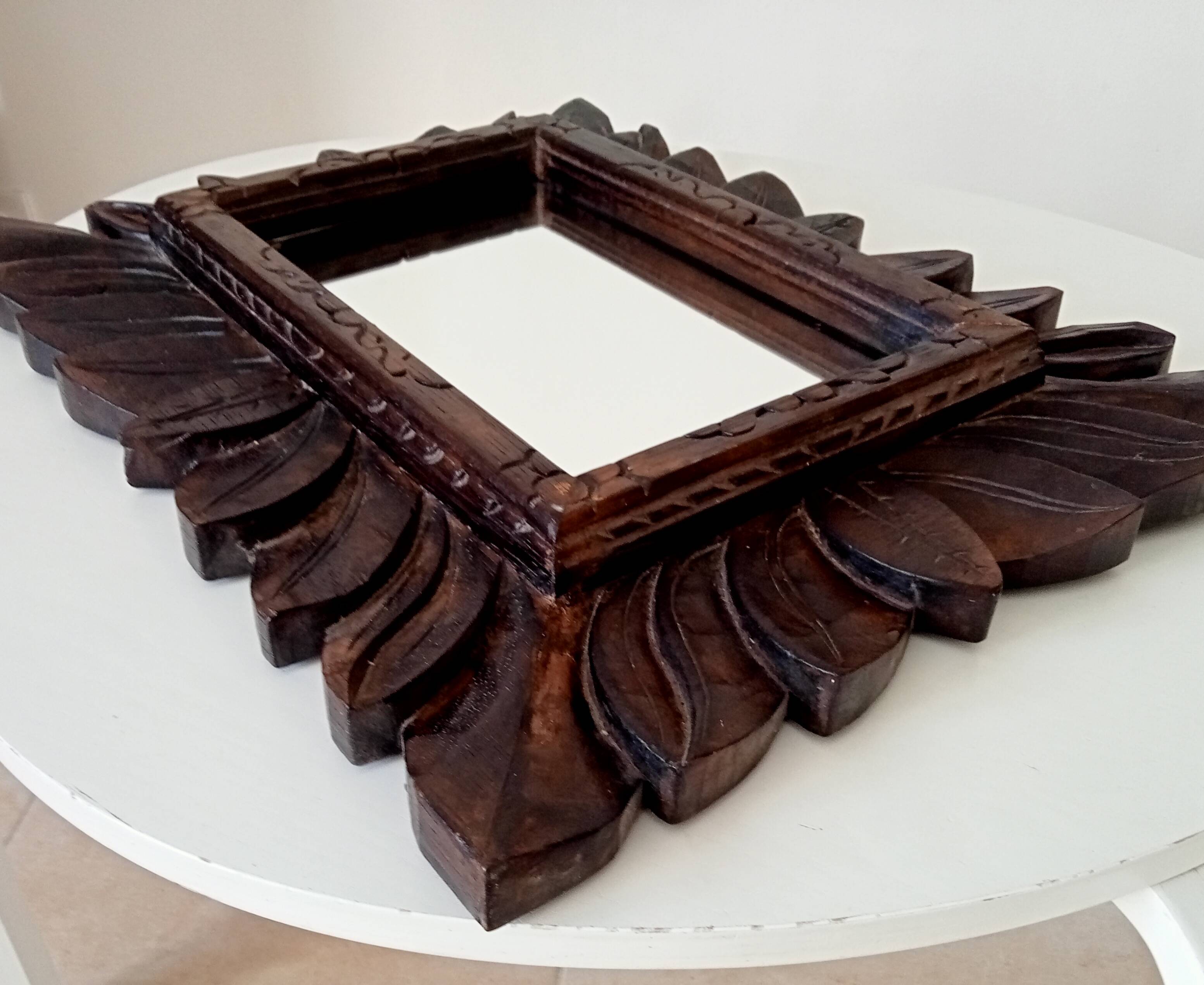 Antique mirror in carved wood