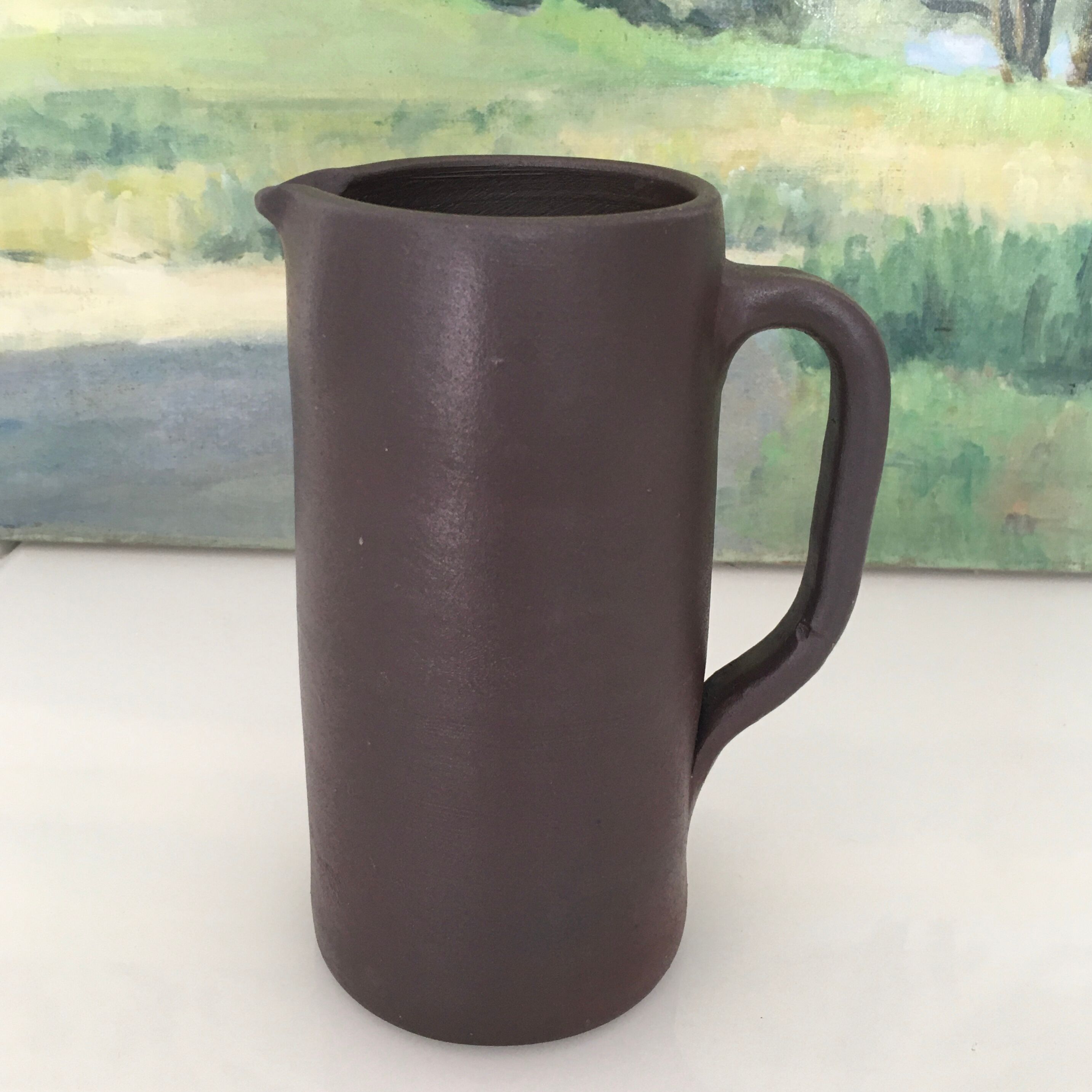 Dark brown sandstone pitcher
