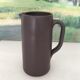 Dark brown stoneware jug
