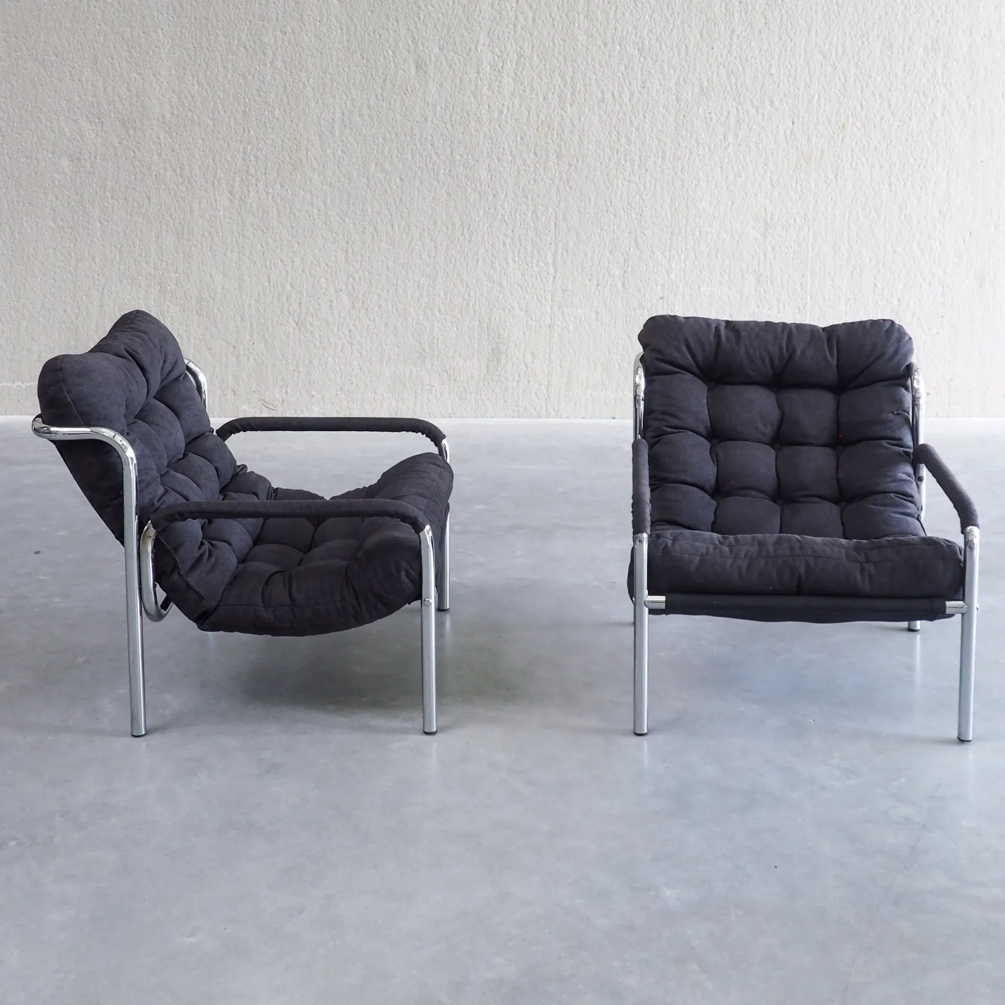 Pair of mid-century modern tubular lounge chairs