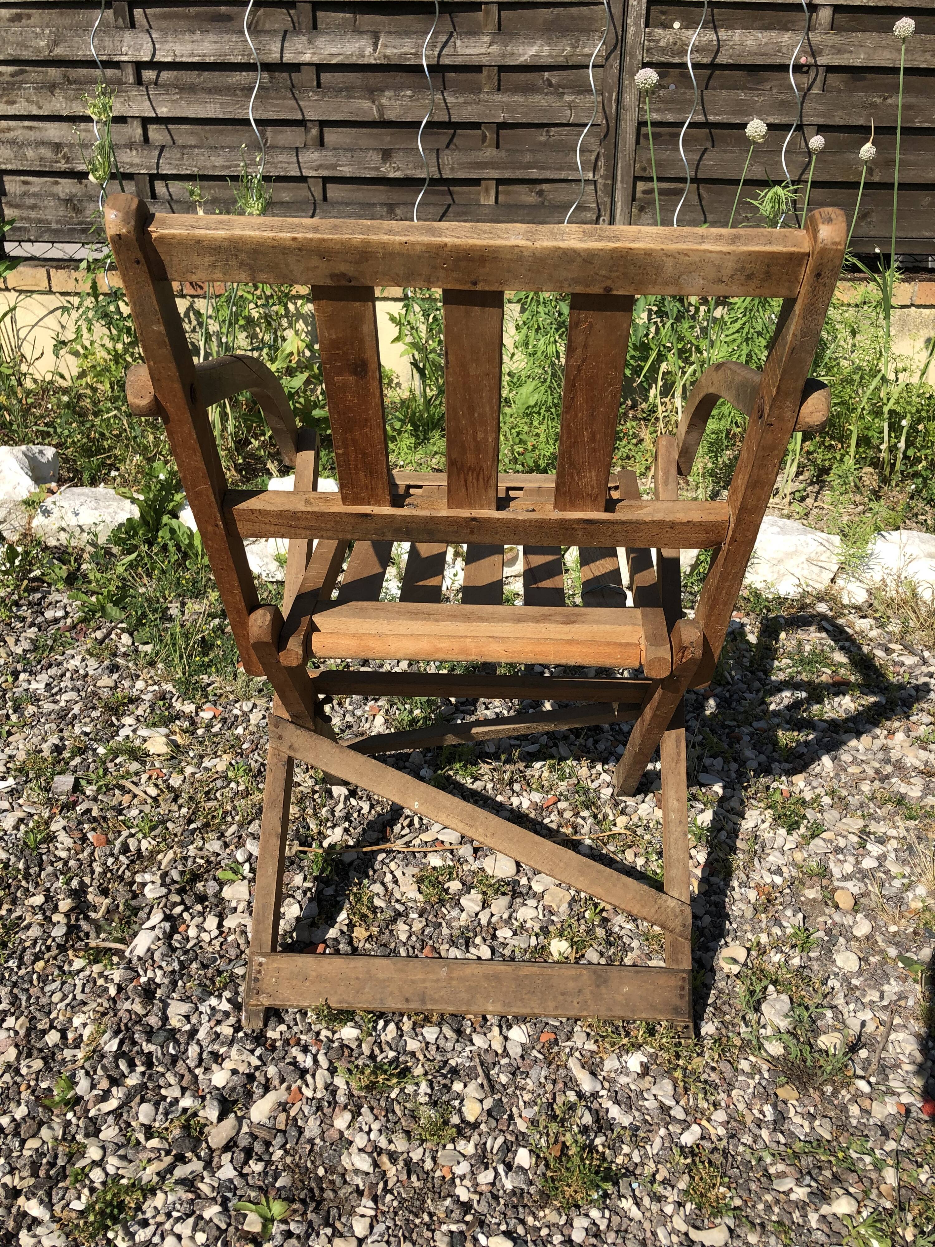 Old folding armchair wooden sitting vintage