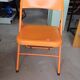 Vintage orange folding chair